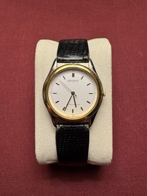 Orient B050RQ90-297 Quartz Dress Watch 32mm Two-Tone Gold Bezel w/ Leather Strap