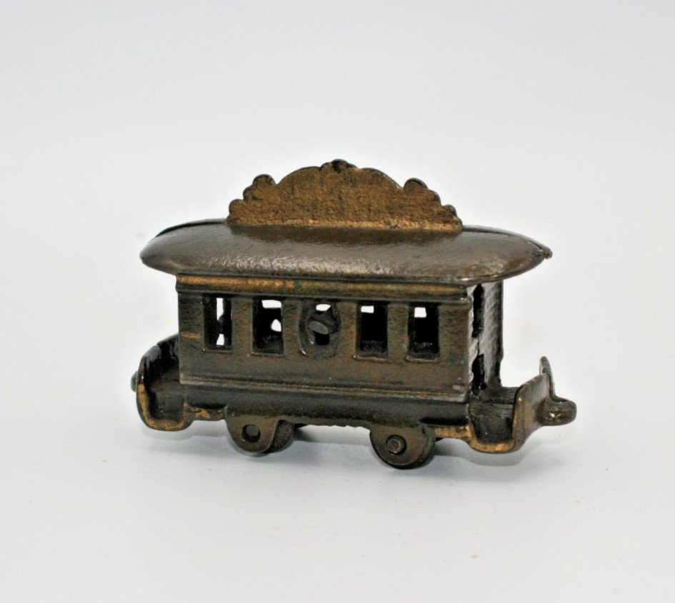 CAST IRON "SMALL TROLLEY" STILL BANK
