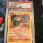 Pokemon Team Rocket Dark Charizard #21 1st Edition PSA 8 English 2000