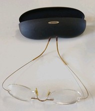 Vintage Silhouette Titan Rimless Eyeglasses Frames Gold / Case