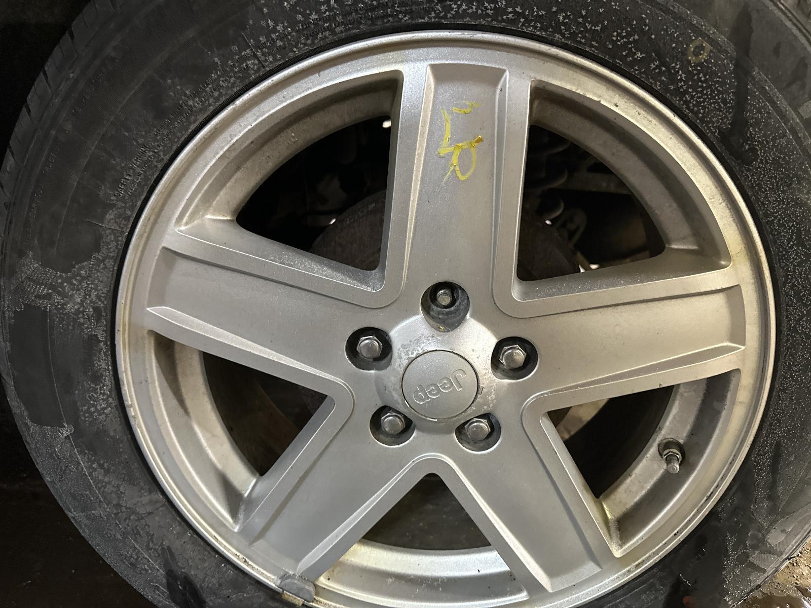 Used Wheel fits: 2008 Jeep Compass 17x6-1/2 alloy 5 spoke silver painted spokes