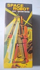 Silver Metal Robot Wind Up Walks Eyes Spark Motor MS 403 SCHYLLING Collectors