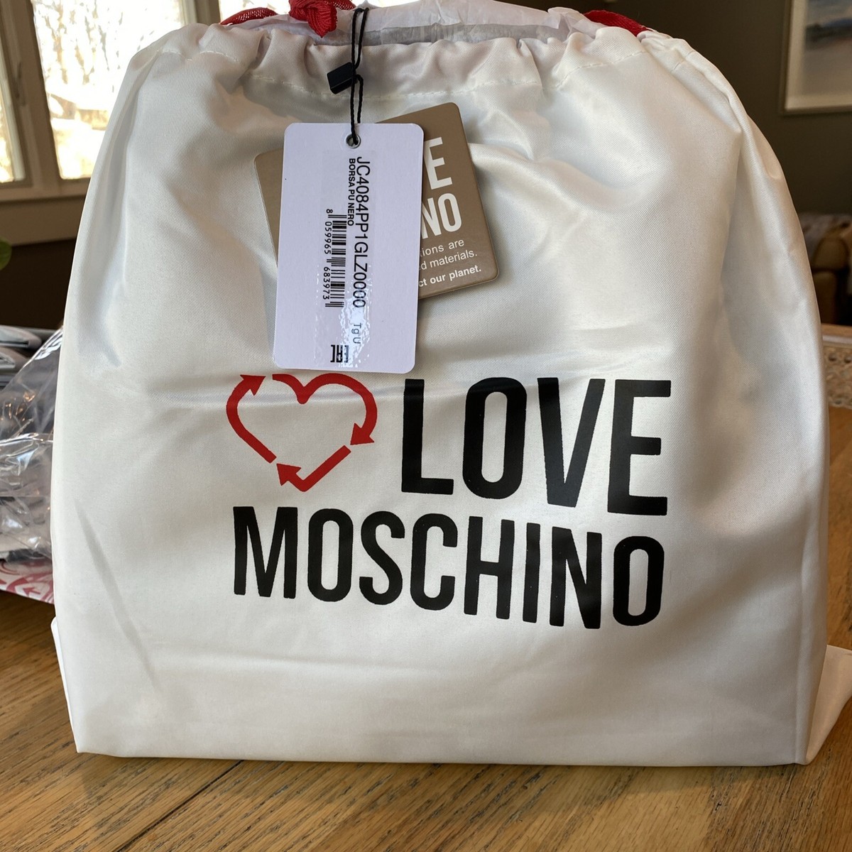【MOSCHINO】ロゴプレート ハートシェイプ トートバッグ Marc Jacobs ザ トート バッグ M | ブラック | FARFETCH JP