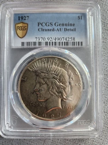 1927 Peace Silver Dollar graded bu PCGS Genuine Cleaned AU Detail