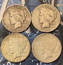 LOT OF 4 CULL 1922-1926 $1 SILVER PEACE DOLLARS MIXED DATES AND MINT MARKS