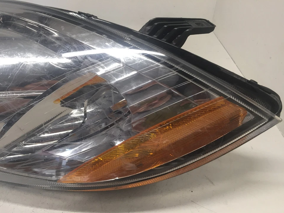 Faro halógeno dañado conductor LH Mitsubishi Eclipse 2006-2011 8301A511 OEM Foto 2 de 4