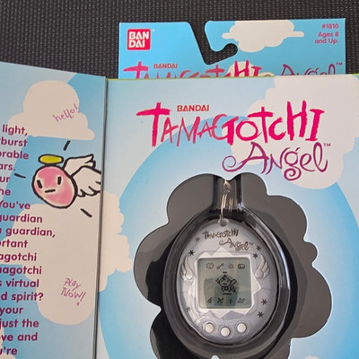 Bandai Tamagotchi Angel Virtual Pet (1997) #1810 - PEARL BLUE