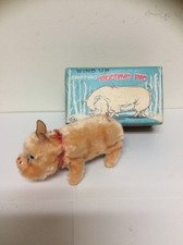 Sniffing Rooting Pig Windup Toy