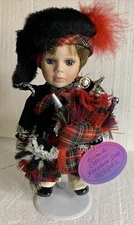 Vintage Leonardo Collection Porcelain Doll "The Piper" with Stand 9” Tall