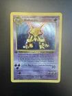 First Edition Base Set Alakazam 1/102 MP Pokemon 1st Edition Card