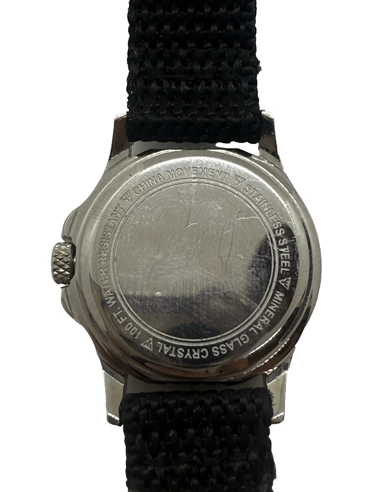 Reloj Dakota Redondo Acero Inoxidable Lona Banda Negra Cristal Mineral 3 ATM Foto 2 de 4