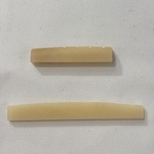 Set aus ungebleichtem Knochen Akustikgitarre Sattel und Mutter
