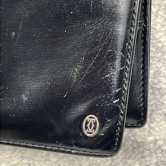 Cartera Cartier Plateada Brillante Cuero Negro Larga Doble Plegable Silenciosa Lujo Atemporal Foto 2 de 4