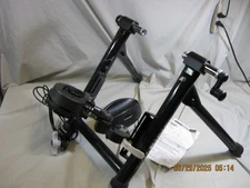 Minoura RDA 2429 rim drive indoor stationary bike trainer with riser and manual