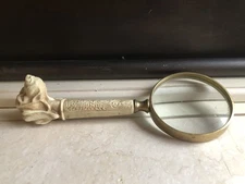 Carved dog head and brass unique magnifying glass