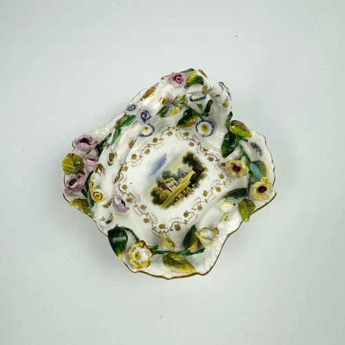 A Rockingham flower-encrusted miniature basket. Puce mark 1831-7
