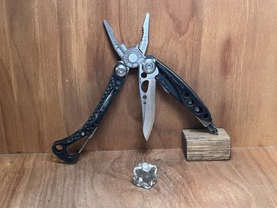 LEATHERMAN Skeletool CX Black Carbon Fiber 154CM Plain Blade EXCELLENT!