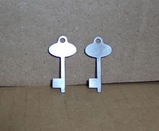 TWO (2) Later Banthrico promo model & building animal bust machine BANK KEYS