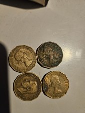 1 BRITISH 1944 GEORGE VI THREEPENCE coin, And 3 Elizabeth Ones