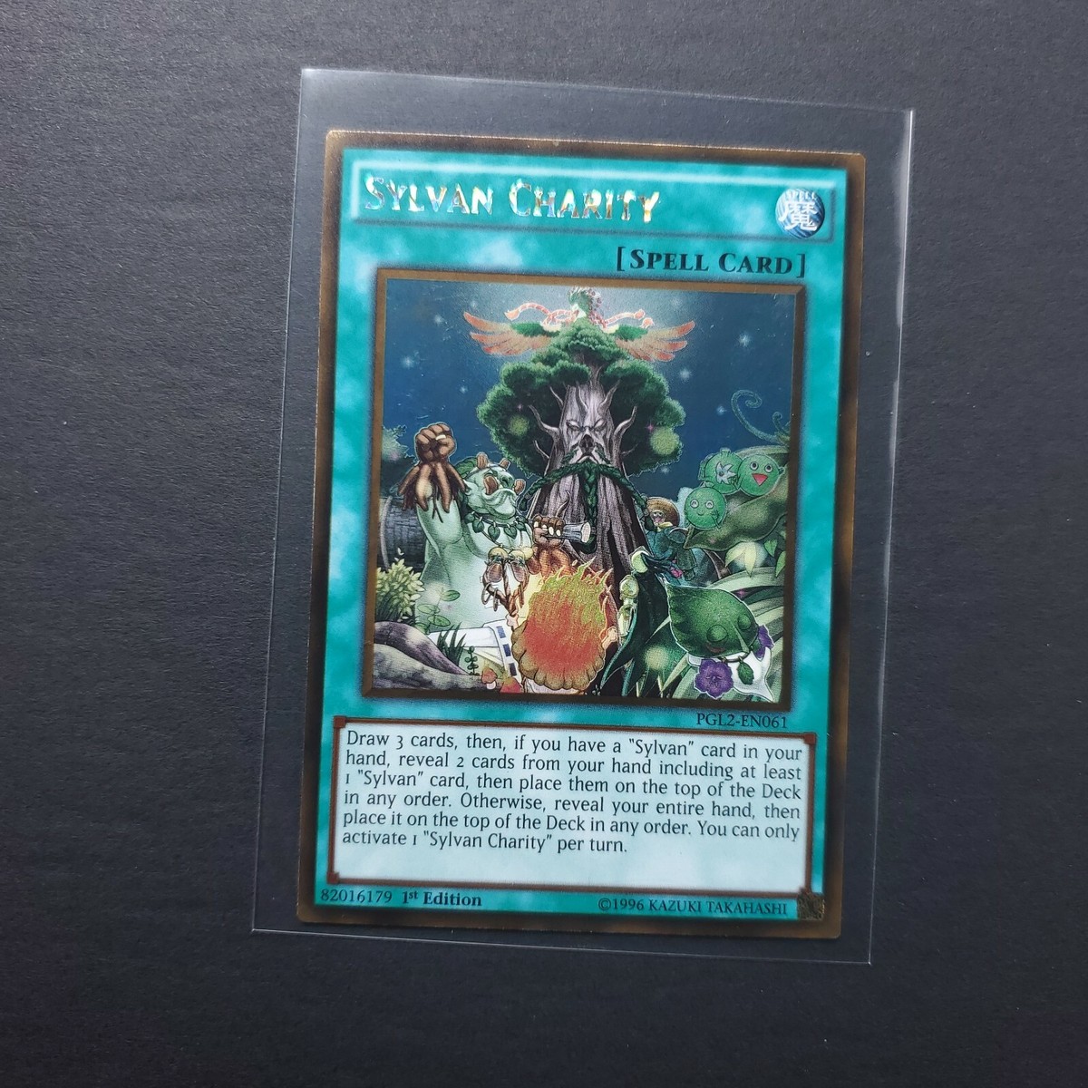 Yu-Gi-Oh! Sylvan Charity Gold Rare – PGL2-EN061, 1st Edition Aus Premium Gold: Return Of The Bling