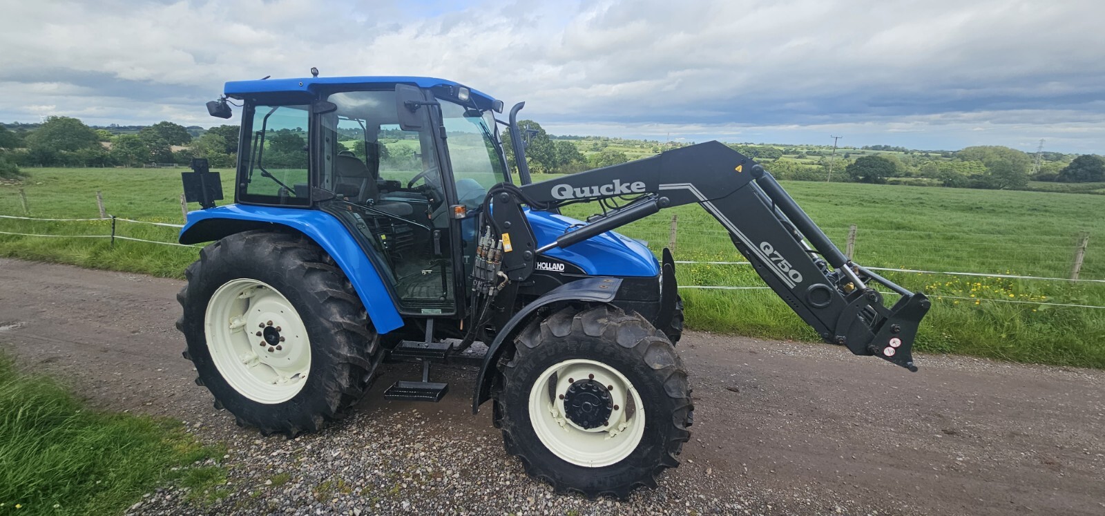 New Holland TL100 4x4 Tractor with Quicke Q750 Loader GWO eBay