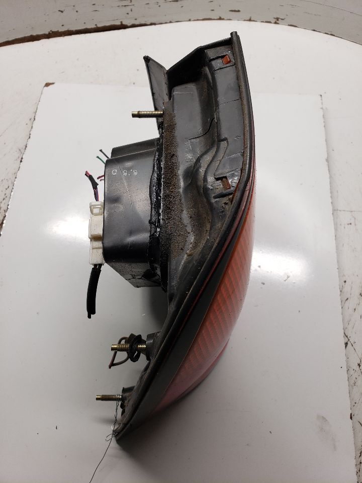 Driver Left Tail Light Quarter Panel Mounted Fits 9596 MAXIMA 1256871