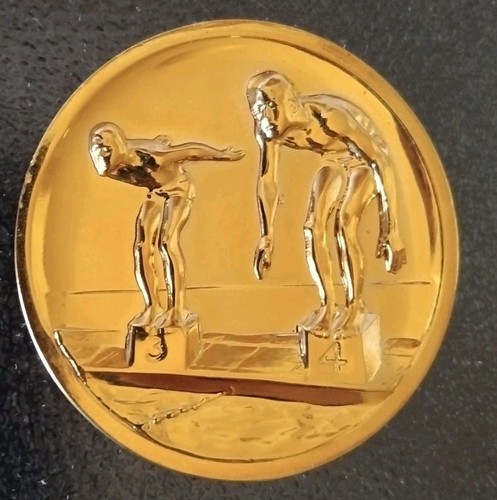 Old medal/emblem/float before start in 3D relief/gold colors,