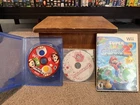 New Super Mario Bros. Wii Bundle. Mario Party 8 Super Mario Galaxy 2 Bundle