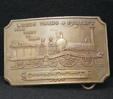 WA23104 VINTAGE 1970s **WELLS FARGO - COLORADO SOUTHERN RAILROAD** BRASS BUCKLE