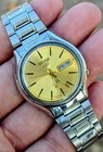 vintage Seiko 5 automatic 17 jewels gold dial Japanese watch day date