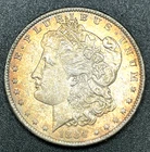 1884 O Morgan 90% Silver Dollar New Orleans Mint Light Rainbow Toning EXCEL