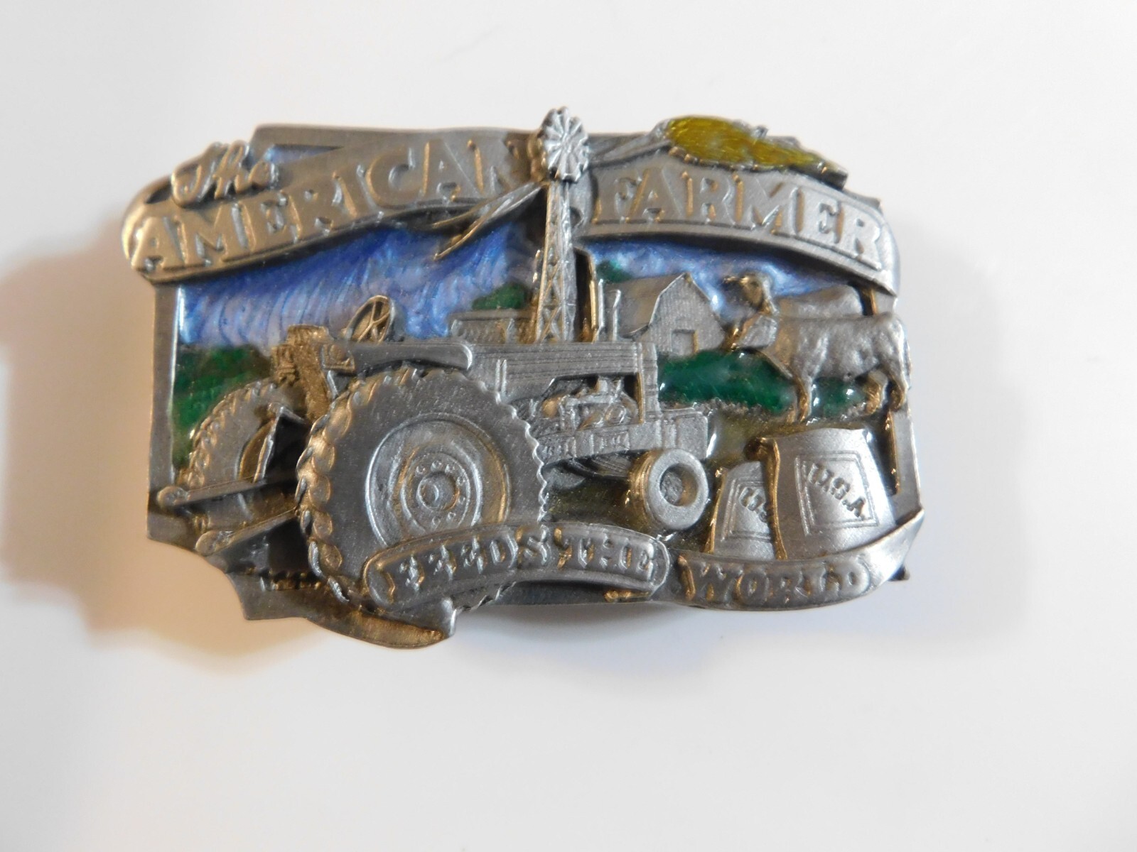 SISKIYOU 1983 THE AMERICAN FARMER FEEDS THE WORLD TRACTOR ENAMEL BELT BUCKLE NOS