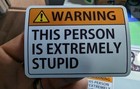 'WARNING THIS PERSON IS EXTREMELY STUPID' 3x2" printed vinyl sticker funny 3 pak