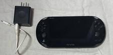 Sony PS Vita (Model: PCH-2001) Slim Handheld Console with compatible charger