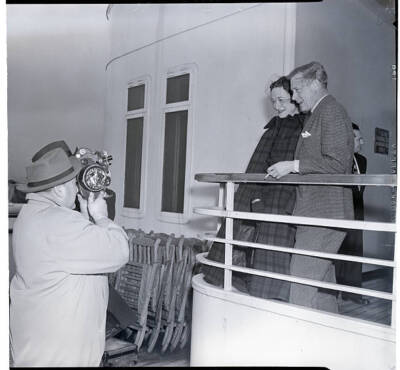 New York A newsreel cameraman focuses Duke Duchess Windsor Dec 26 t- 1949 Photo