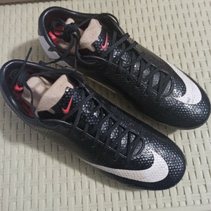 green and gold nike football cleats