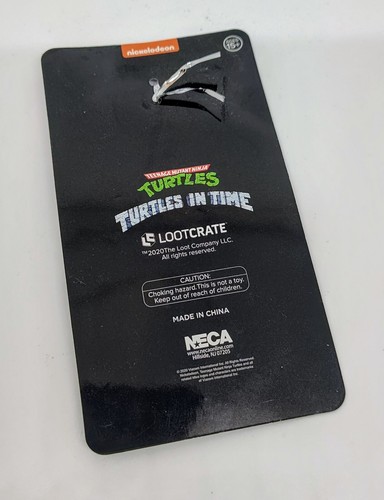Loot Crate Exclusive TMNT Sewer Surfin’ Spinning Keychain Turtles In Time - Picture 3 of 3