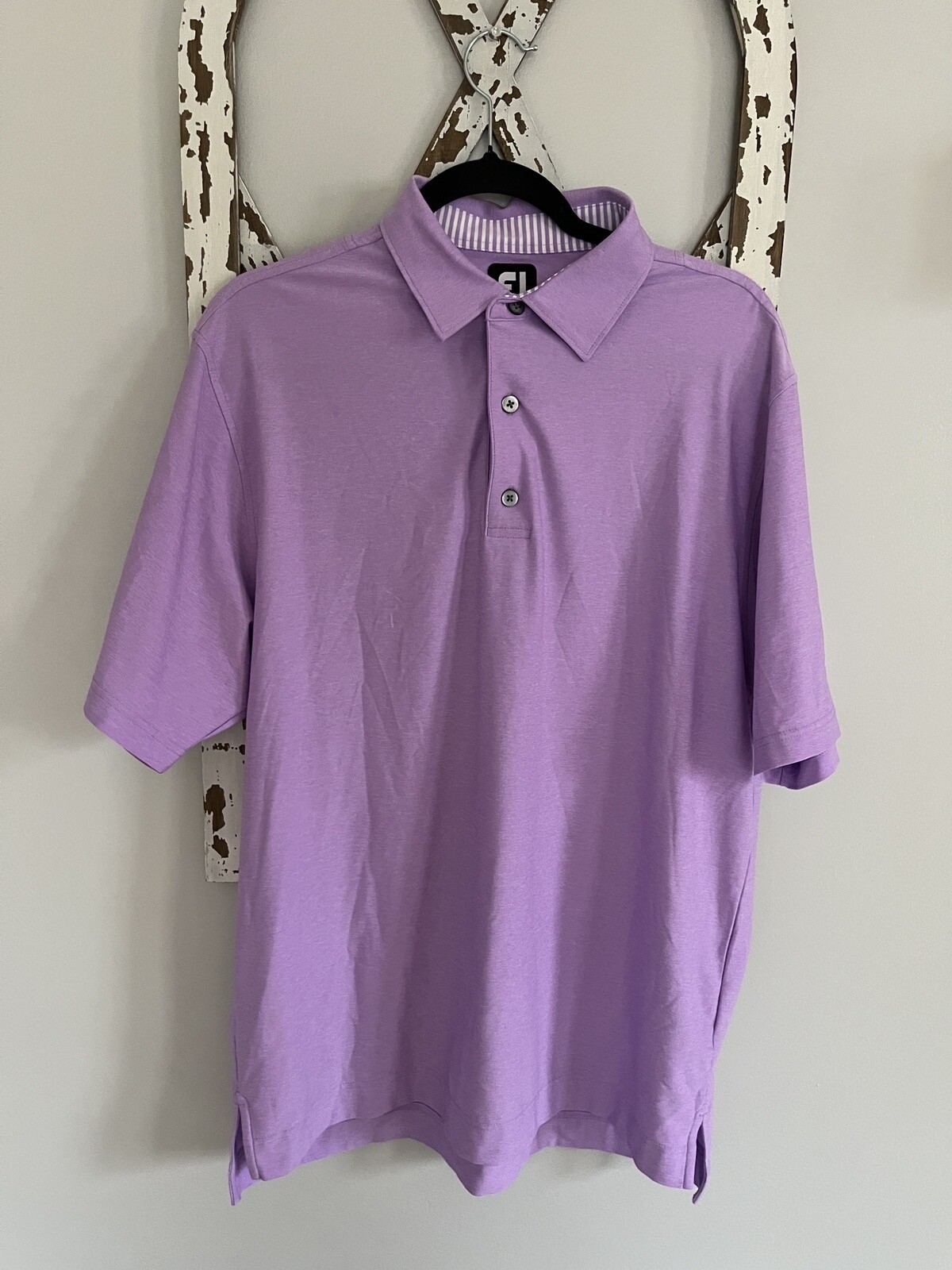 FootJoy Polo size medium light purple EUC logo on sleeve as shown in photo