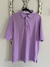 FootJoy Polo size medium light purple EUC logo on sleeve as shown in photo