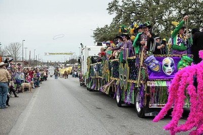 Photo:Bandera Texas 2014 Mardi Gras Parade Cowboy Capital Float Masks