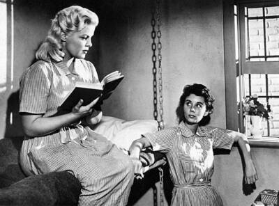 American actress Cleo Moore reading book prison cell film One Girl- Old Photo