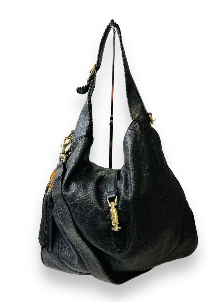 Gucci black crossbody with tassel hot sale