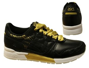 asics gold trainers