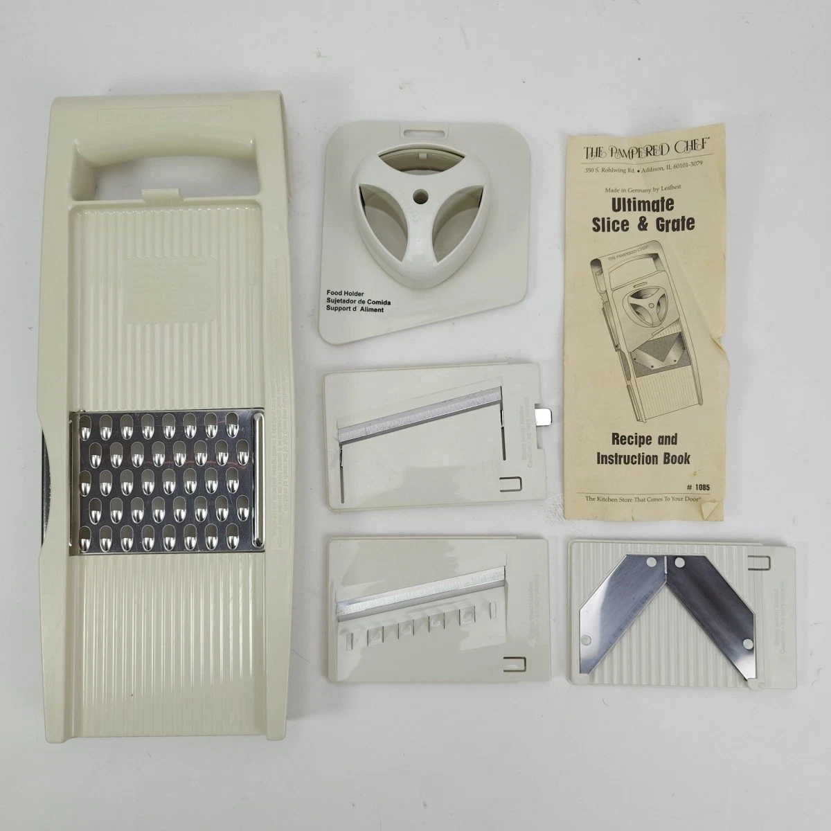 PAMPERED CHEF Ultimate Slice & Grate Mandoline Slicer 4 Blades Food Holder
Opens in a new window or