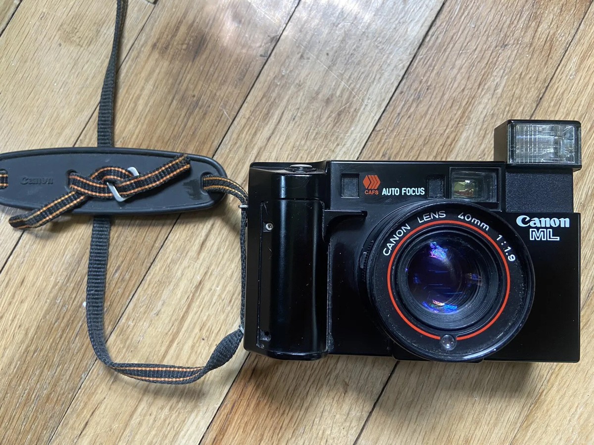 Canon AF35ML 40mm 1.9 black point and shoot 35mm camera clean USA