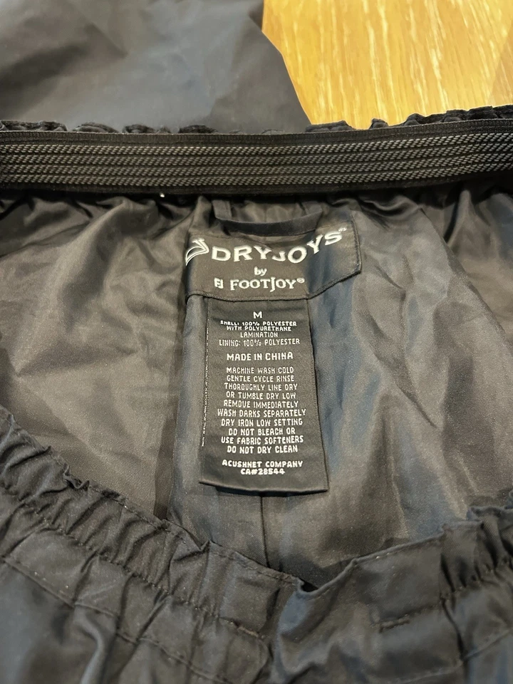 Pantalones de lluvia Dry Joy by Foot Joy para hombre negros talla mediana golf Foto 2 de 4