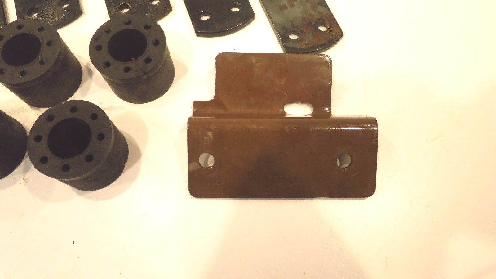 OEM LOT OF MISC. PARTS MOUNT / BUSHINGS / EXTENSION SPRING