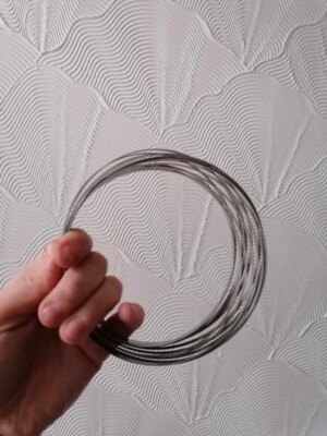 Silber Magic Flow Ring Spielzeug Kinetische Feder Infinity Arm Slinky Jongliertanz UK