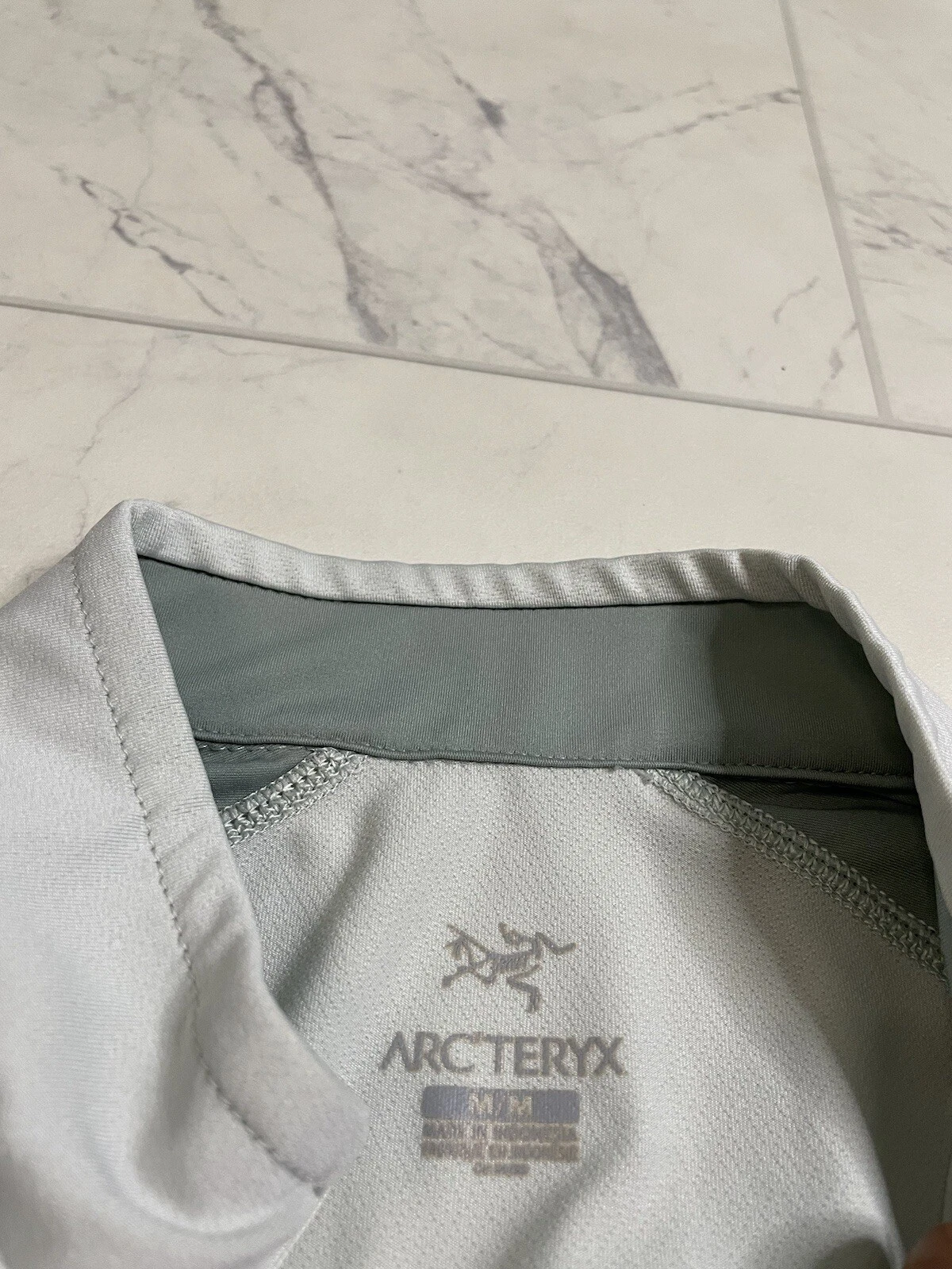 arcteryx light off white 1/4 zip rho style base-layer