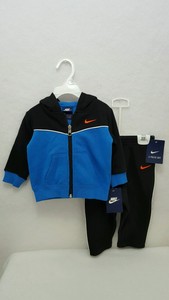 blue and orange nike jogging suit